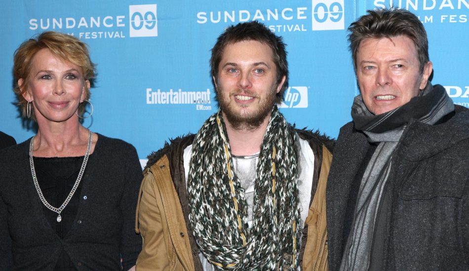 (L-R) Producer Trudie Styler, director Duncan Jones and musician David Bowie attend the 'Moon' premiere during the 2009 Sundance Film Festival at the Eccles Theater on January 23, 2009 in Park City, Utah. © RD/ Leon / Retna Digital